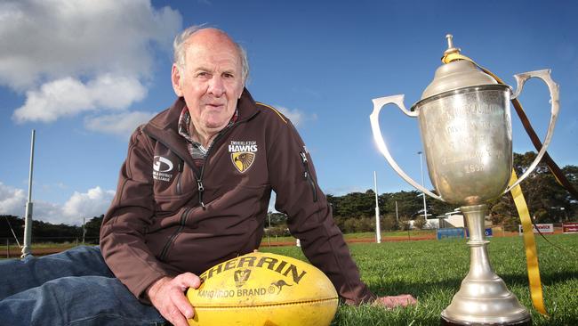 Malcolm Quinlivian, who played in the last premiership Inverleigh won 25 years ago, pictured pictured with the 1992 premiership cup picture: Glenn Ferguson