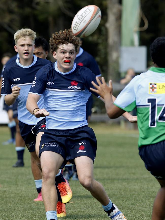 Manni Campbell eyes the ball.