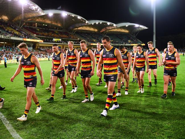 Adelaide Crows players leave the ground after the round three loss at the hands of the Geelong Cats at Adelaide Oval. Picture: Mark Brake/Getty Images