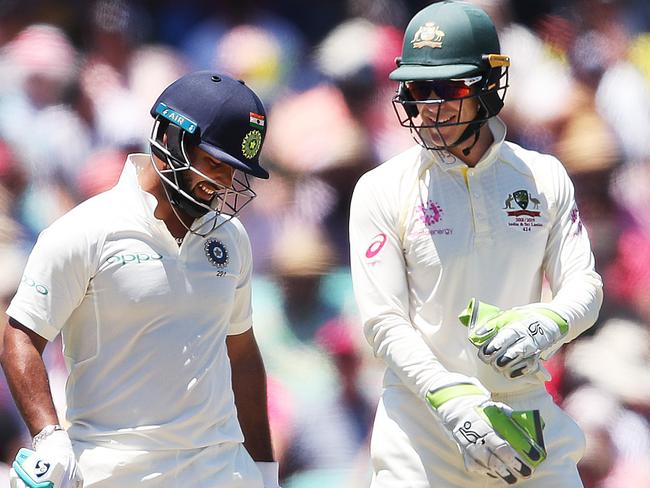 India's Rishabh Pant has a laugh with Australia's Tim Paine during Day 2 of 4th Test match between Australia and India at the SCG. Picture. Phil Hillyard