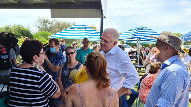 PM Scott Morrison attends an event at Bribie Island where positive cases later emerged.