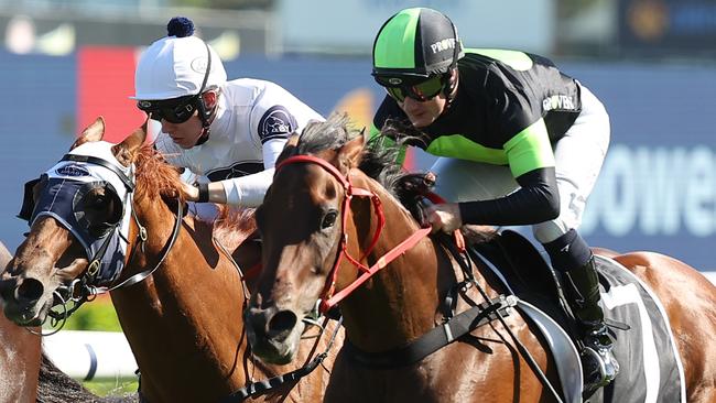 Cosmonova (right) has the measure of Queen Of The Mile at Randwick on Saturday. Picture: Jeremy Ng/Getty Images