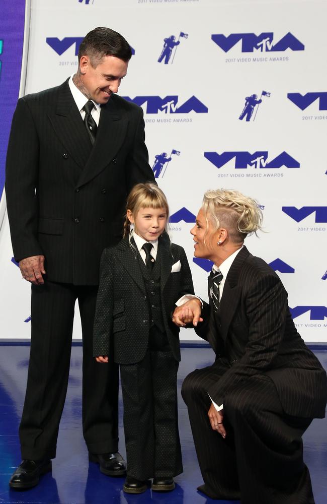 ‘We help other people to change so that they can see more kinds of beauty.’ Pink, her husband Carey Hart and their daughter, Willow. Picture: AFP