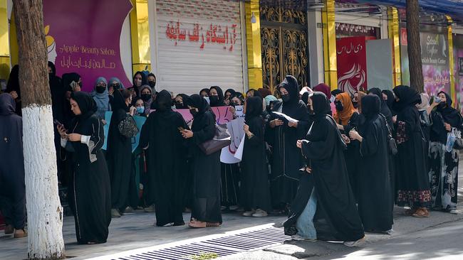 Afghan women stage a protest for their rights at a beauty salon in Kabul last week after the Taliban ordered beauty parlours across the country to shut. Picture: AFP