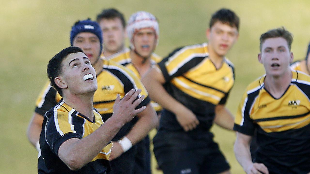 ISA1's Joe Walsh eyes the ball in rugby selection trials. Picture: John Appleyard