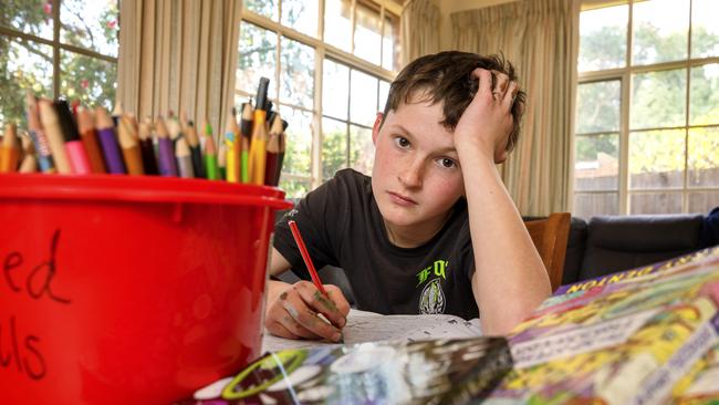 Zac Hay, 11, is upset about not being able to return to school yet. Picture: David Geraghty