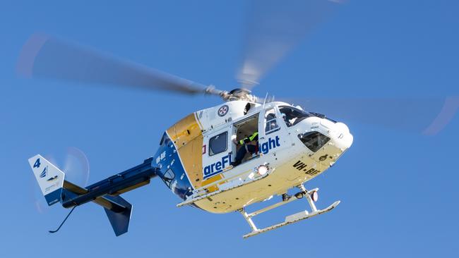 A 13-month-old girl has been flown to hospital in a stable condition after falling into a fire at a property in South Maroota.