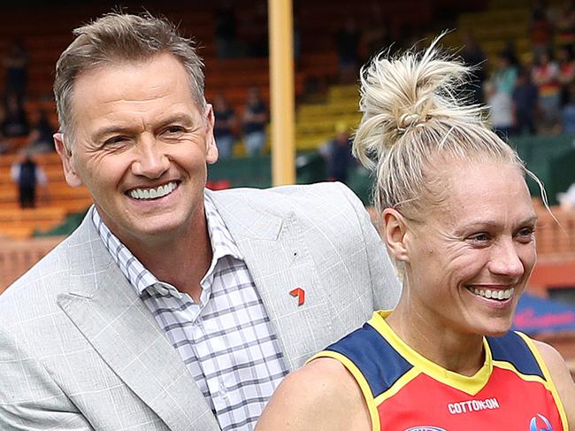 ADELAIDE, AUSTRALIA - MARCH 28: Breakfast radio host Mark Soderstrom congratulates his radio partner partner and Crows player Erin Phillips after the win in the 2021 AFLW Round 09 match between the Adelaide Crows and the Collingwood Magpies at Norwood Oval on March 28, 2021 in Adelaide, Australia. (Photo by Sarah Reed/AFL Photos via Getty Images)