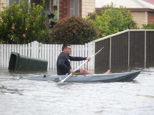 Wollongong resident Justin Craig paddles in the streets / Picture: Ian Svegovic