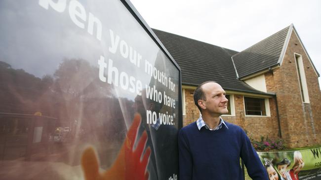 Anglican Minister Tim Swan, outside his parish, hitting out against the government's abortion bill. Photo: Tim Pascoe