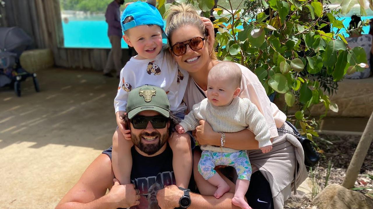 Aaron Woods with son Buster, partner Sarah and daughter Coco.