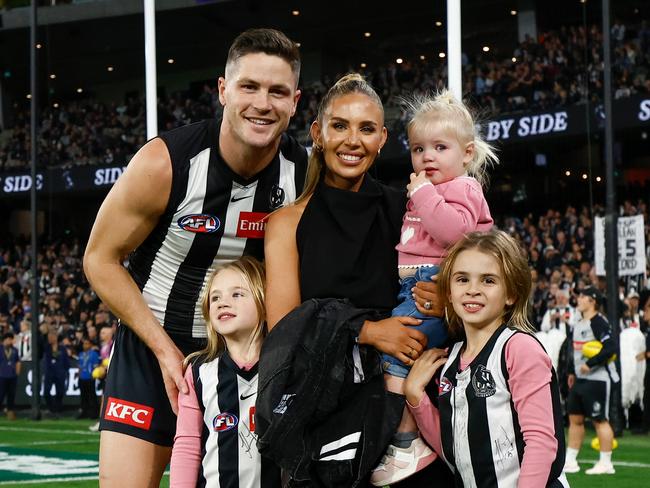 Jack Crisp with wife Mikayla and their daughters before the game. (Photo by Michael Willson/AFL Photos via Getty Images)