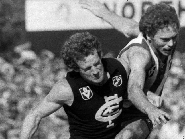 Peter Francis (left), playing for Carlton, competes for the ball with North Melbourne’s Maurice Boyse in 1980.