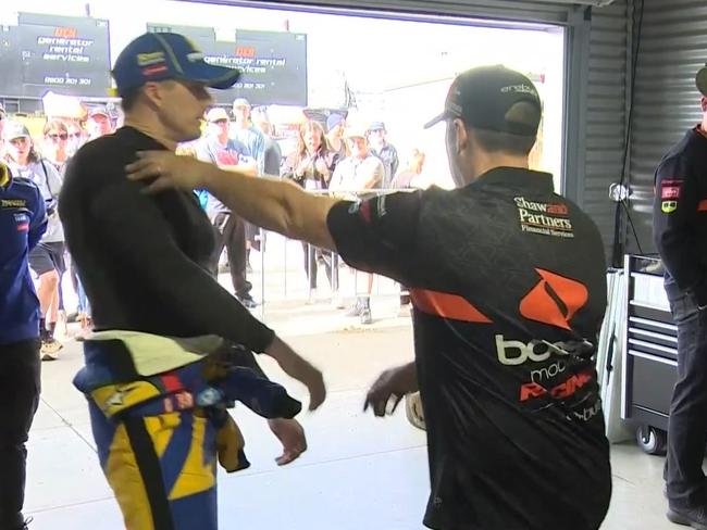 Mark Winterbottom is pushed away trying to apologise for a crash.