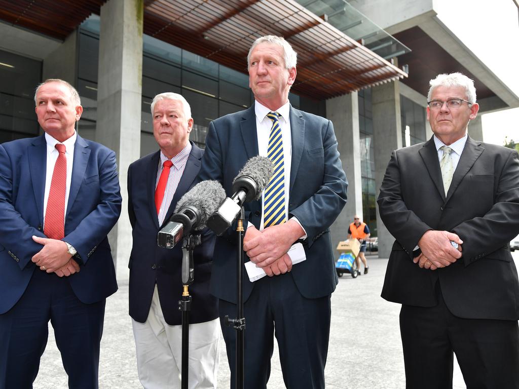 (L-R) Joe, John, Dennis and Neill Wagner speak to the media outside the Supreme Court in Brisbane, Wednesday, September 12, 2018. Alan Jones and his team have been ordered to pay a record $3.7 million in compensation for defaming a Queensland family by claiming they were responsible for 12 deaths in the 2011 Lockyer Valley floods. (AAP Image/Darren England) NO ARCHIVING