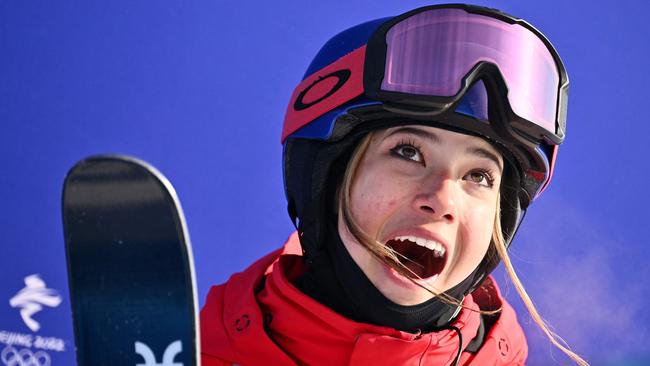 China's Eileen Gu is shocked at her stunning half-pipe score.