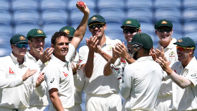 Steve O'Keefe holds the ball up after taking six wickets in the first innings against India in 2017, he would go on to record figures of 12-70 for the match.