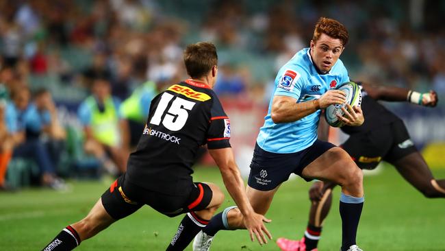 Andrew Kellaway of the Waratahs runs the ball during the round two Super Rugby match against the Stormers at Allianz Stadium.