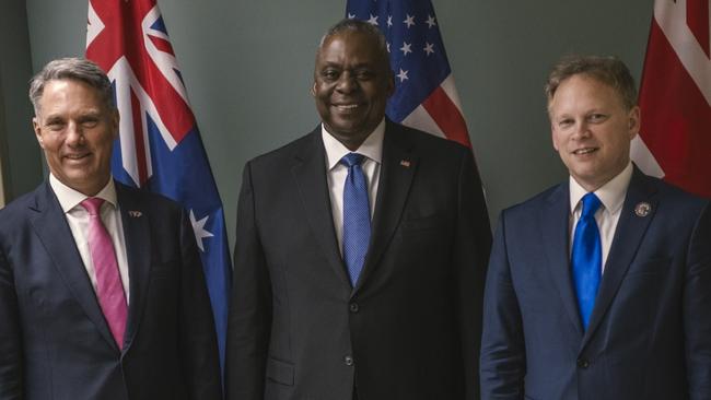 US Secretary of Defence Lloyd Austin III (centre), Defence Minister Richard Marles (left) and UK Secretary of State for Defence Grant Shapps (right) at the US Defence Innovation Unit in California for the second AUKUS Defence Ministers’ Meeting in early December. Picture: Lloyd Austin III, X (formerly Twitter).