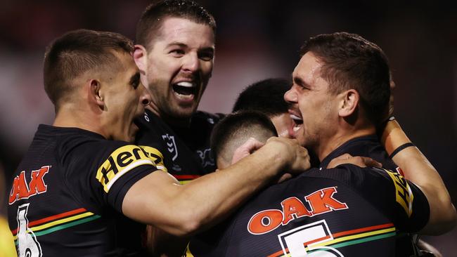 PENRITH, AUSTRALIA - JUNE 03: Chris Smith of the Panthers celebrates with team mates after scoring a try during the round 13 NRL match between the Penrith Panthers and the Canterbury Bulldogs at BlueBet Stadium on June 03, 2022, in Penrith, Australia. (Photo by Matt King/Getty Images)