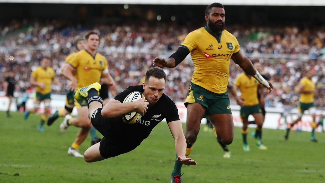 Ben Smith of the All Blacks scores a try during the Bledisloe Cup Test in Yokohama.