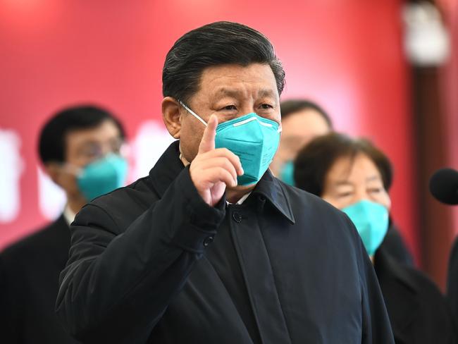 Chinese President Xi Jinping talks to coronavirus patients and medical staff via a video link at the Huoshenshan hospital in Wuhan. Picture: AFP