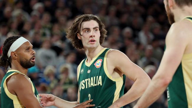 MELBOURNE, AUSTRALIA - AUGUST 16: Patty Mills and Josh Giddey of Australia react during the match between the Australia Boomers and Brazil at Rod Laver Arena on August 16, 2023 in Melbourne, Australia. (Photo by Kelly Defina/Getty Images)