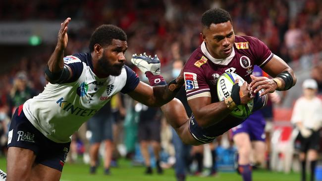 Filipo Daugunu dives for a try in the Reds’ win over the Rebels. Picture: Getty Images