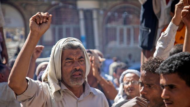 Yemenis in the city of Taez on Thursday rally in support of the Trump administration's designation of the Houthis as a terrorist organisation. Picture: AFP