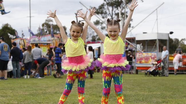 Selina Porracin, 6, and Grace Heylbut, 7, jump for joy.