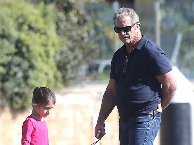 NO WEB UNTIL 16th JULY FEE APPLIES - GROUP RIGHTS NO NEWS.COM MUST CREDIT INF/SPLASH July 15th 2015: Mel Gibson & daughter Lucia Gibson spotted in sydney hotel pool area, than taking a walk to a Sydney wharf EXCLUSIVE Mandatory Credit: INFphoto.com Ref: infausy-12