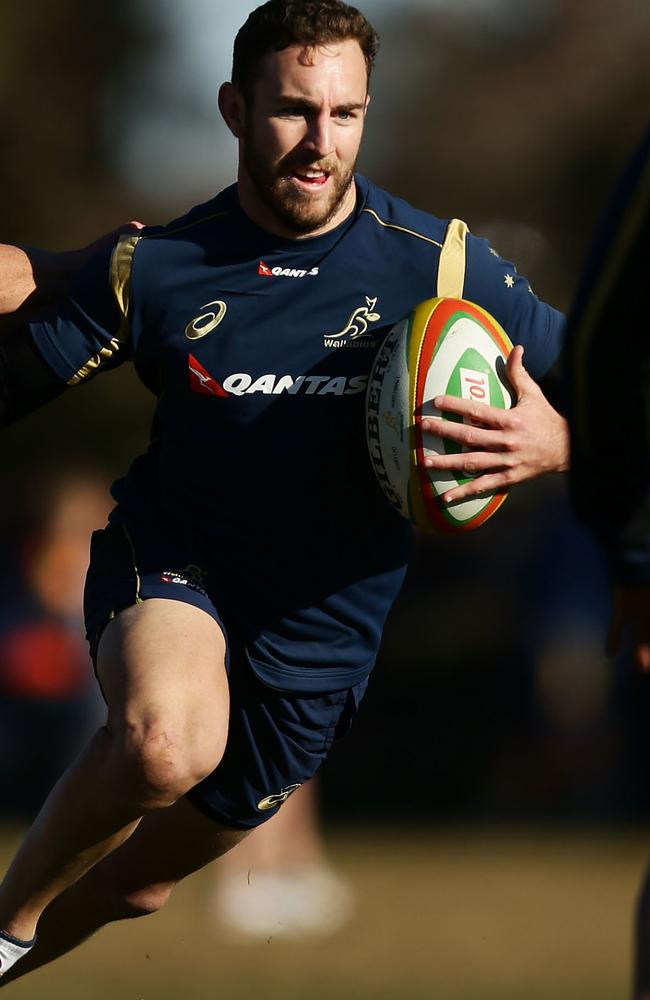 Nic White trains with the Wallabies in Orange.