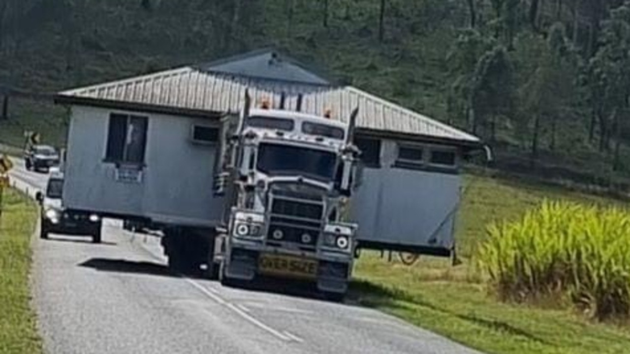 VIDEO: House driven down Qld highway