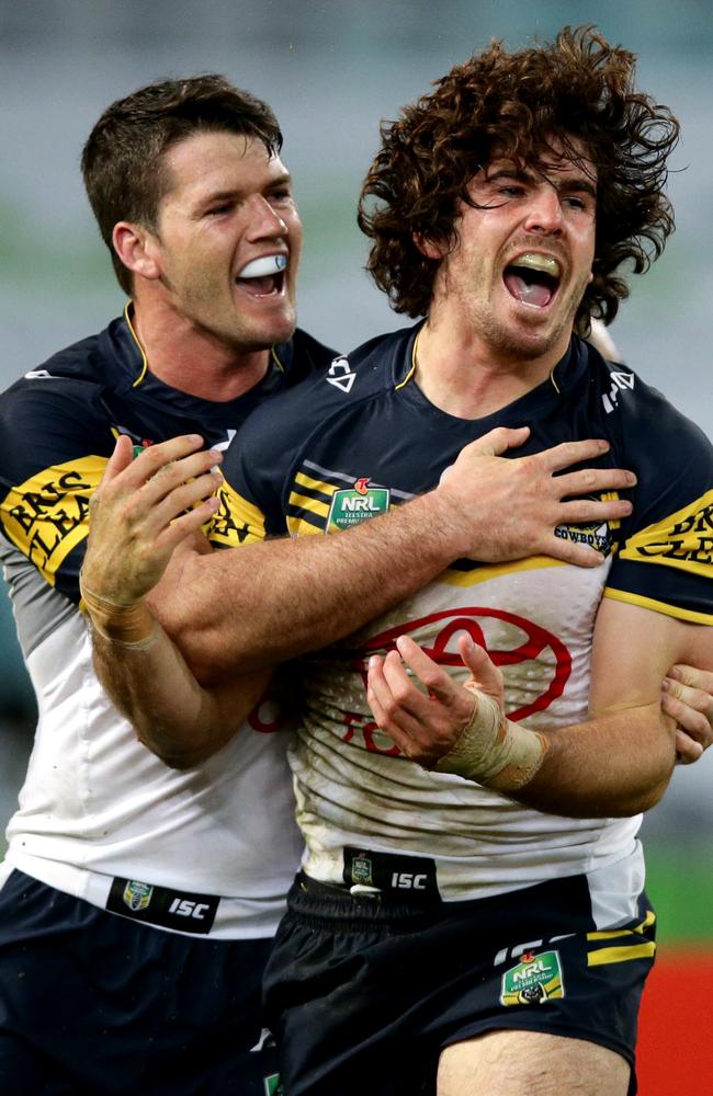 Cowboy Jake Granville celebrates scoring a try with Lachlan Coote. Picture: Gregg Porteous