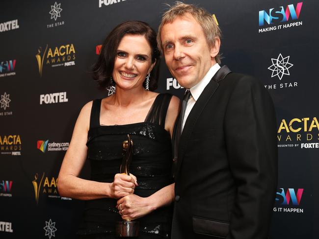 Robyn Butler and Wayne Hope after winning the AACTA Award for Best Television Comedy Series. Picture: Caroline McCredie/Getty