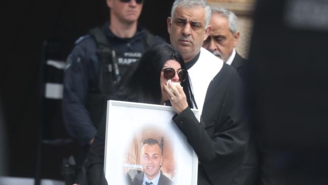 Funeral of Fares Abounader wa held today at the saint Charbels mission church in Punchbowl . A variety of interesting people attended along with Stike force Raptor and NSW Police .picture John Grainger