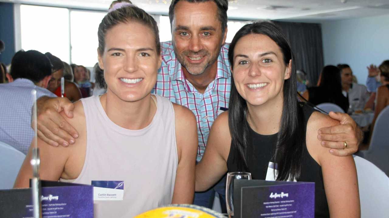 Sunshine Coast Lightning goal shooter Caitlin Basset with Netball Australia&#39;s Dave Lee and Emily Murch at the Maroochy Surf Club. Picture: Erle Levey