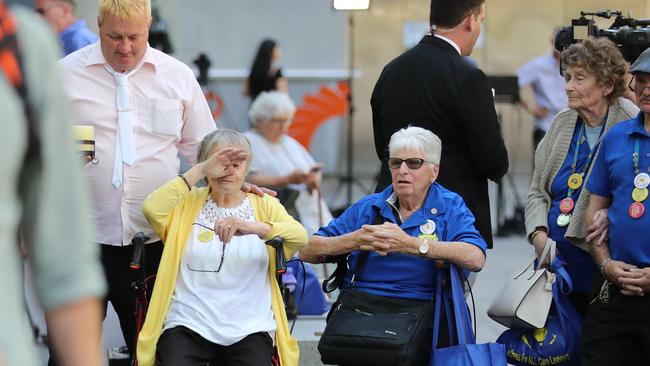 An emotional victims’ advocate sheds a tear outside court. Picture: Alex Coppel