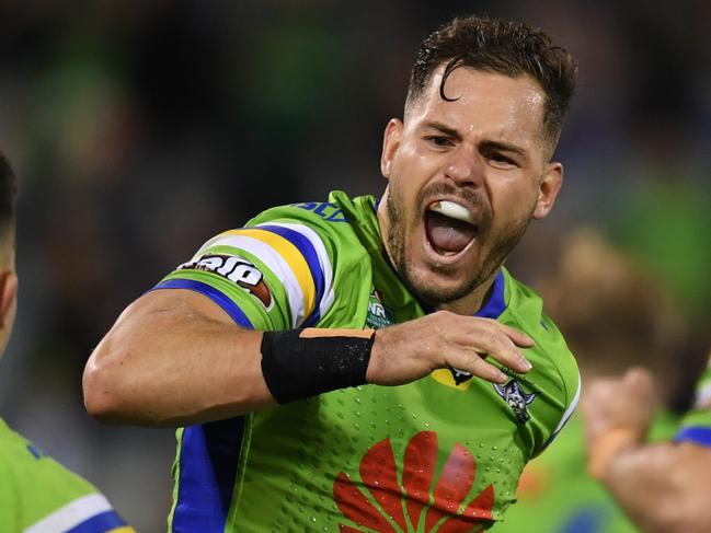 Aiden Sezer of the Raiders celebrates with team mates after kicking a last minute field goal during the Round 12 NRL match between the Canberra Raiders and the Manly-Warringah Sea Eagles at GIO Stadium in Canberra, Friday, May 25, 2018. (AAP Image/Lukas Coch) NO ARCHIVING, EDITORIAL USE ONLY