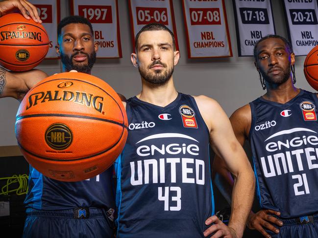 Melbourne United players Marcus Lee, Chris Goulding and Ian Clark during the NBL finals. Picture: Mark Stewart