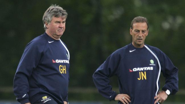 EINDHOVEN, NETHERLANDS - MAY 29:  Australian coach Guus Hiddink looks on with his assistants Graham Arnold and Johan Neeskens during a training session as Australia prepare for the 2006 World Cup, held at the Mierlo training ground May 29, 2006 in Eindhoven, Netherlands.  (Photo by Robert Cianflone/Getty Images)