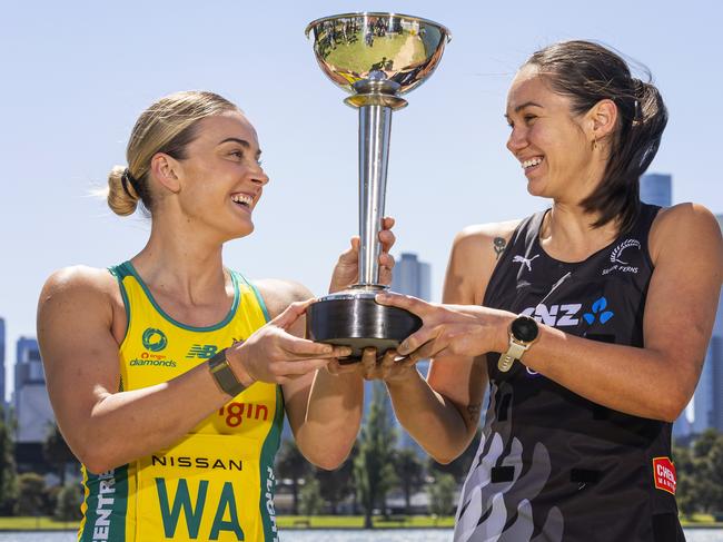 MELBOURNE, AUSTRALIA - OCTOBER 11: Australian Diamonds captain Liz Watson (L) and New Zealand Silver Ferns captain Ameliaranne Ekenasio pose for a photograph with the Constellation Cup during a 2023 Constellation Cup Media Opportunity at Albert Park on October 11, 2023 in Melbourne, Australia. (Photo by Daniel Pockett/Getty Images)