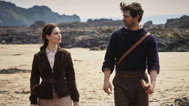 Lily James as Juliet and Michiel Huisman as Dawsey in a scene from film The Guernsey Literary and Potato Peel Pie Society