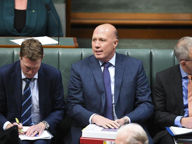 Australian Home Affairs Minister Peter Dutton reacts during House of Representatives Question Time at Parliament House in Canberra, Monday, 22 July, 2019. (AAP Image/Lukas Coch)