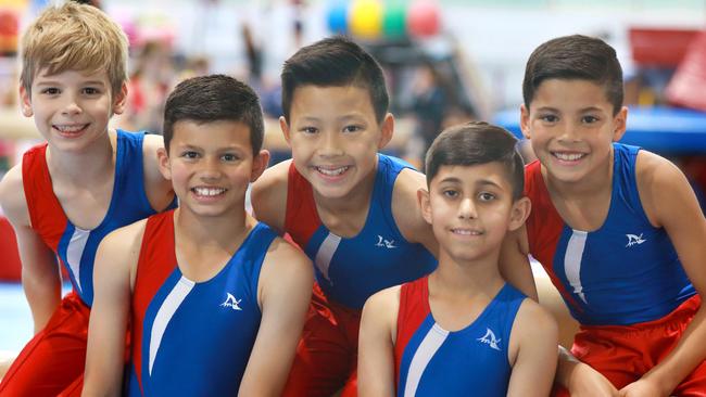 Gymnasts Owen Hecimovic, Cooper Du Sart, Jobey Mok, Anoop Singh and Flynn Wilson .