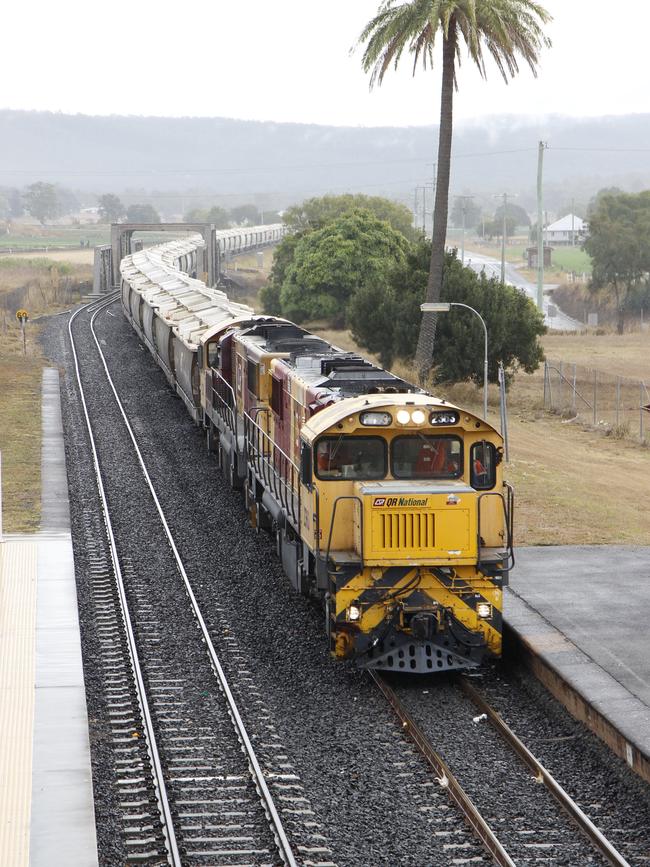 A QR National coal train travels through Gatton.