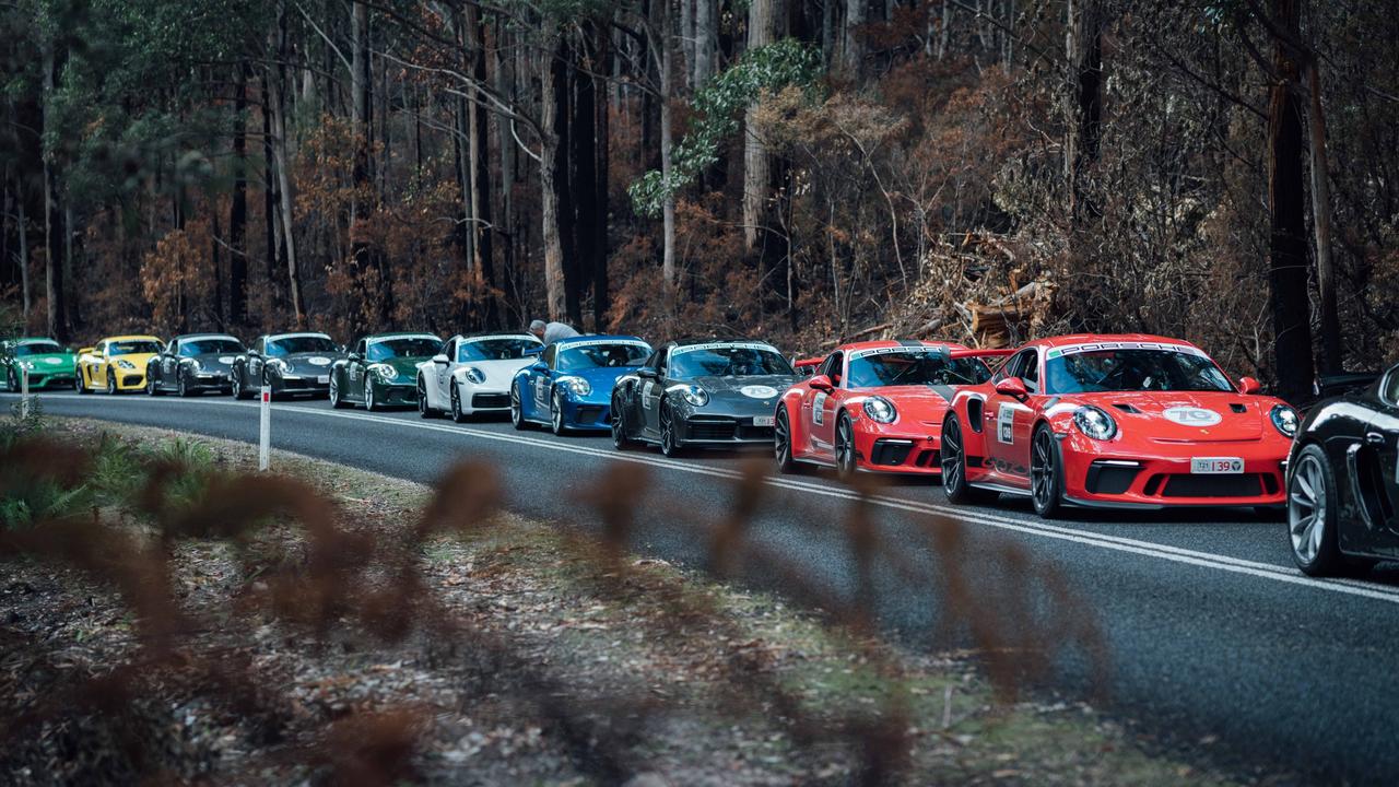 Dozens of Porsches join a speed-limited “tour” event each year.