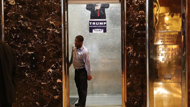 A worker in the entrance to a service elevator in the lobby of Trump Tower. Picture: Spencer Platt/Getty Images/AFP