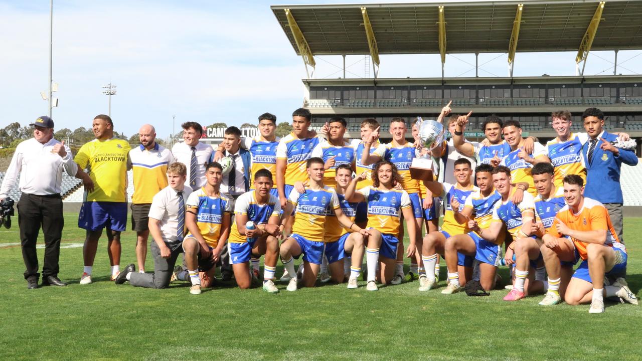 Patrician Brothers College players celebrate after winning the Peter Mulholland Cup grand final between Patrician Brothers Blacktown and Endeavour Sports High. Picture: Warren Gannon Photography