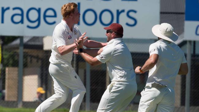 Tea Tree Gully bowler Thomas Barrett celebrates one of his two wickets for the match. Picture: Simon Stanbury